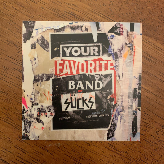 Your Favorite Band Sucks Logo Sticker on a wood surface, collage logo artwork
